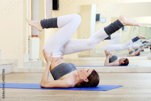 beautiful girl doing exercises in the gym