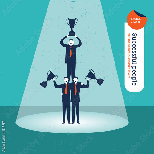 Pyramid of businessmen with trophies