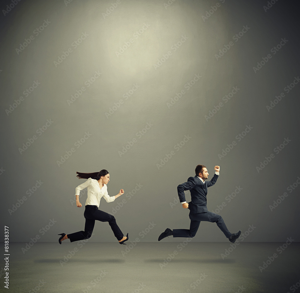 man and woman running fast