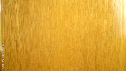 Male hand is knocking on wooden door