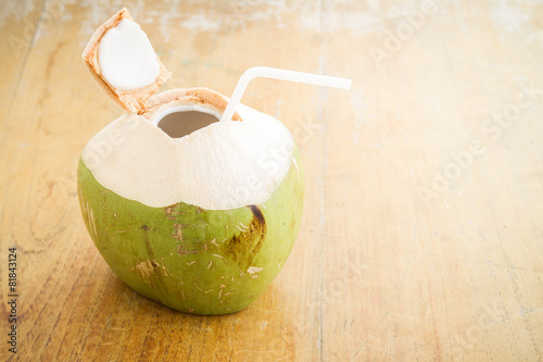 Fresh Coconut Water Drink on wooden table