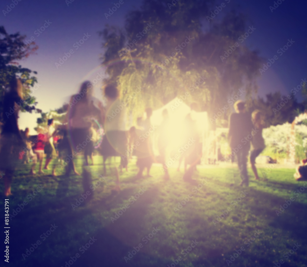 Fototapeta premium people mingling at a free concert by musicians in a garden
