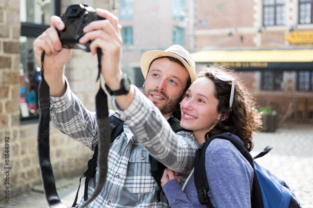 Young couple on holidays taking selfie
