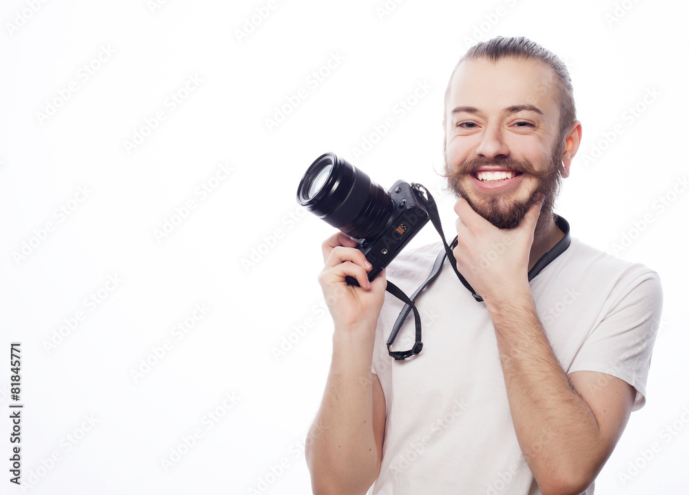 Fototapeta premium bearded man with a digital camera