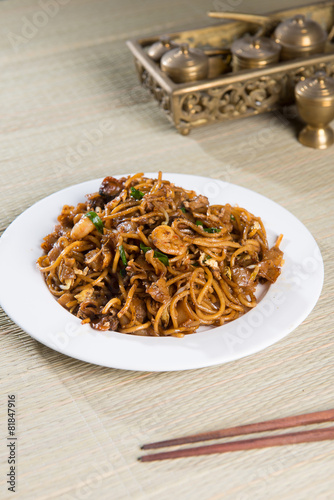 Fried Penang Char Kuey Teow which is a popular noodle dish in Ma photo