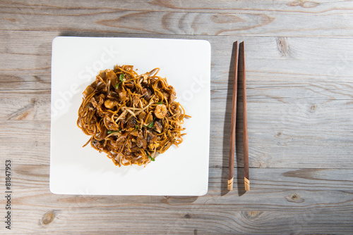 Fried Penang Char Kuey Teow which is a popular noodle dish in Ma photo