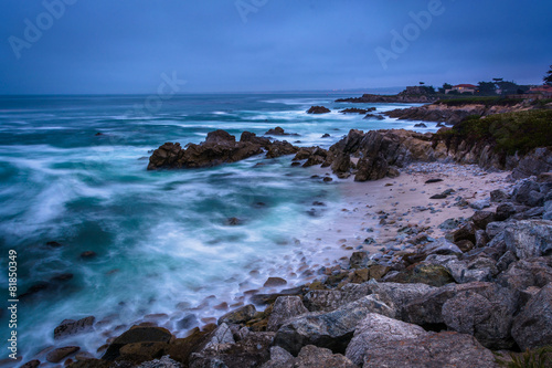 Long exposure of rocks and waves in the Pacific Ocean at twiligh