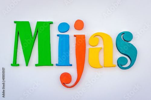 Cuadro en lienzo Colored word Mijas. Andalusian town in Spain