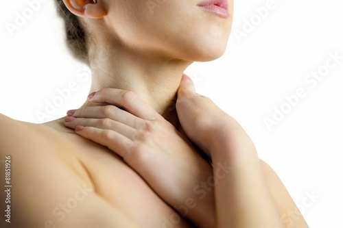 Nude woman with a neck injury
