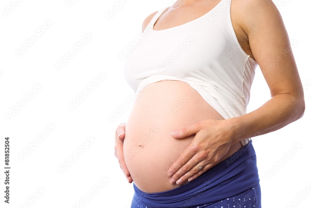 Pregnant woman holding her bump Pregnant woman holding her bump