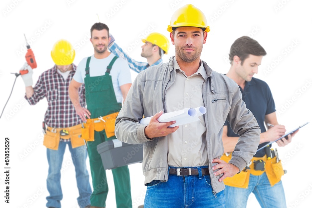 Composite image of architect looking at camera Composite image of architect looking at camera