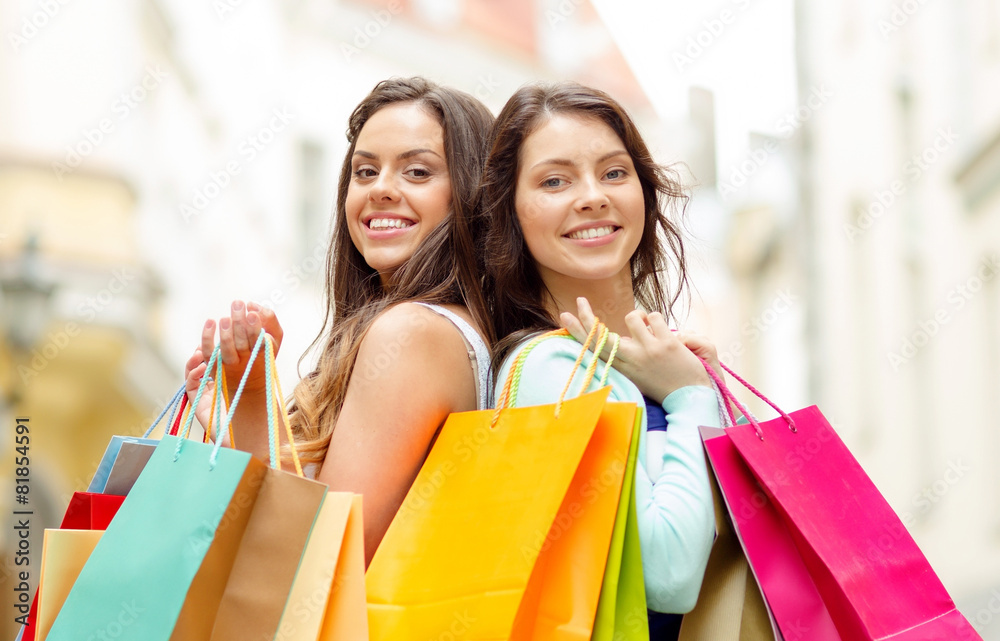 beautiful women with shopping bags in the ctiy beautiful women with shopping bags in the ctiy