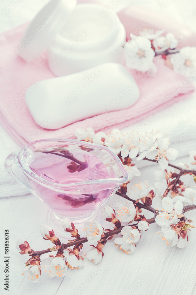 still life of sea salt and essential oils and apricot flowers still life of sea salt and essential oils and apricot flowers