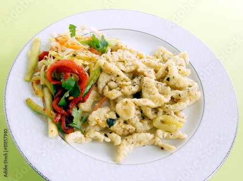 noodles and vegetables as vegetarian dinner dish photo