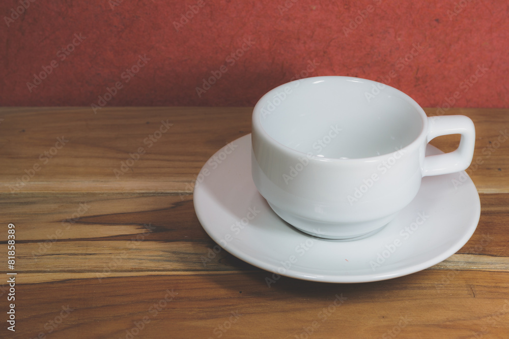 Empty coffee cup on a wooden, Process color with Vintage Tones. Empty coffee cup on a wooden, Process color with Vintage Tones.