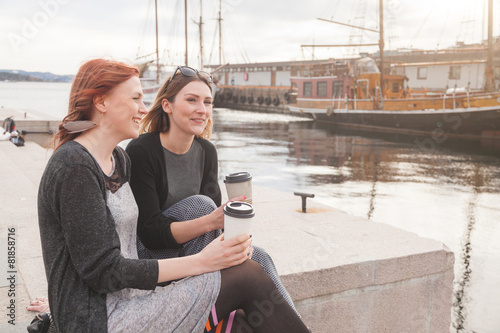 Photography Two beautiful nordic girls enjoying life at Oslo harbour
