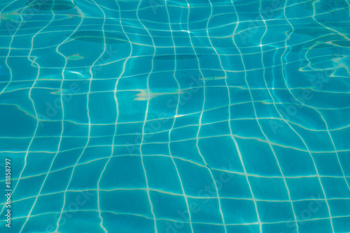 Ripple water in swimming pool, Texture background.