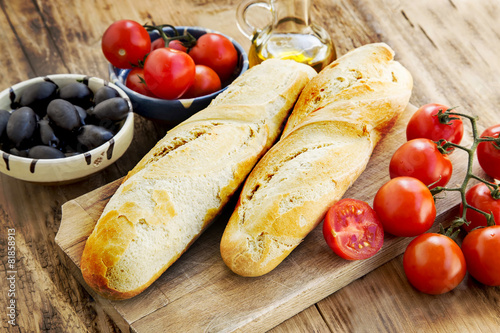 Baguette Bread with Cherry Tomatoes, Olive Oil and Olives