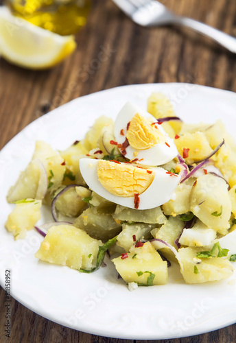 Fresh Organic Potato Salad with Boiled Eggs and Chili Flakes