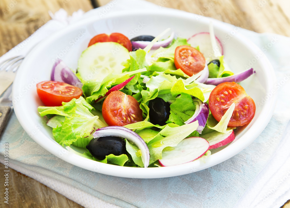 Vegetables Salad Dish with Fresh Organic Lettuce,Tomatoes,Olives