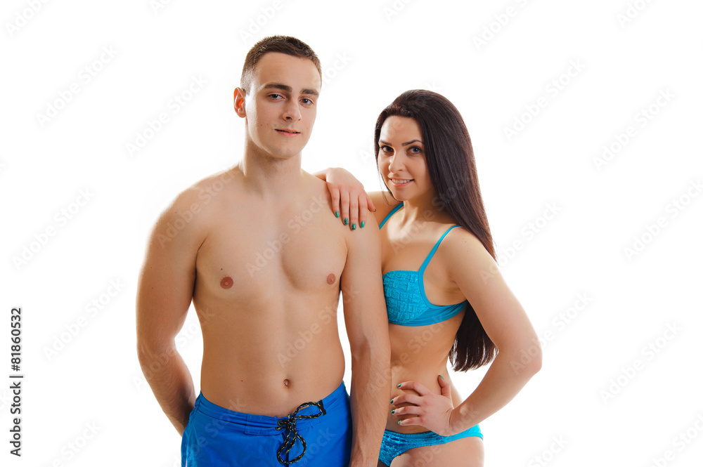 Loving couple in swimwear isolated on white background Loving couple in swimwear isolated on white background
