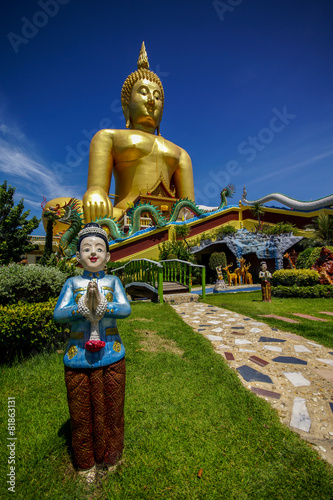 Big Buddha Image with Welcome Boy Statue © goldquest