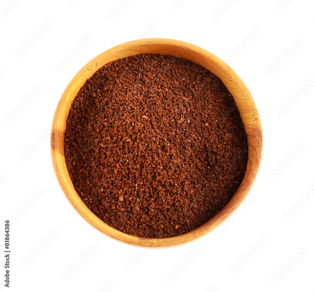 Ground coffee in small dish isolated on white Ground coffee in small dish isolated on white