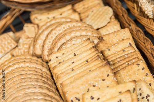 Cracker Biscuits In Wood Basket Close Up