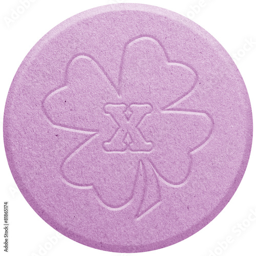 Pink Ecstasy pill isolated on white photo