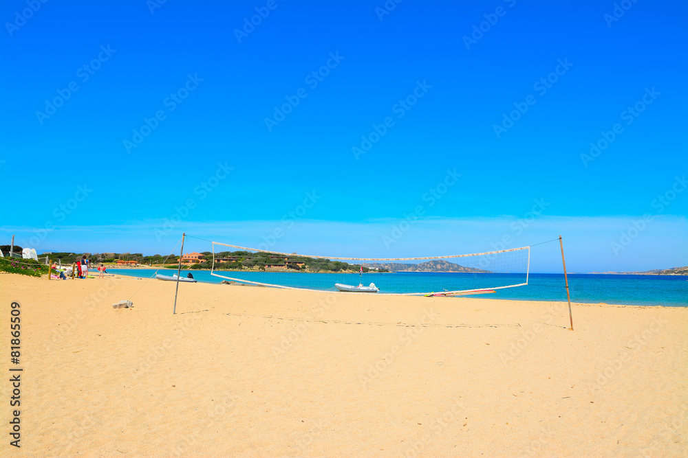 beach volley net and rubber boats in Porto Pollo