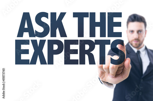Business man pointing the text: Ask the Experts