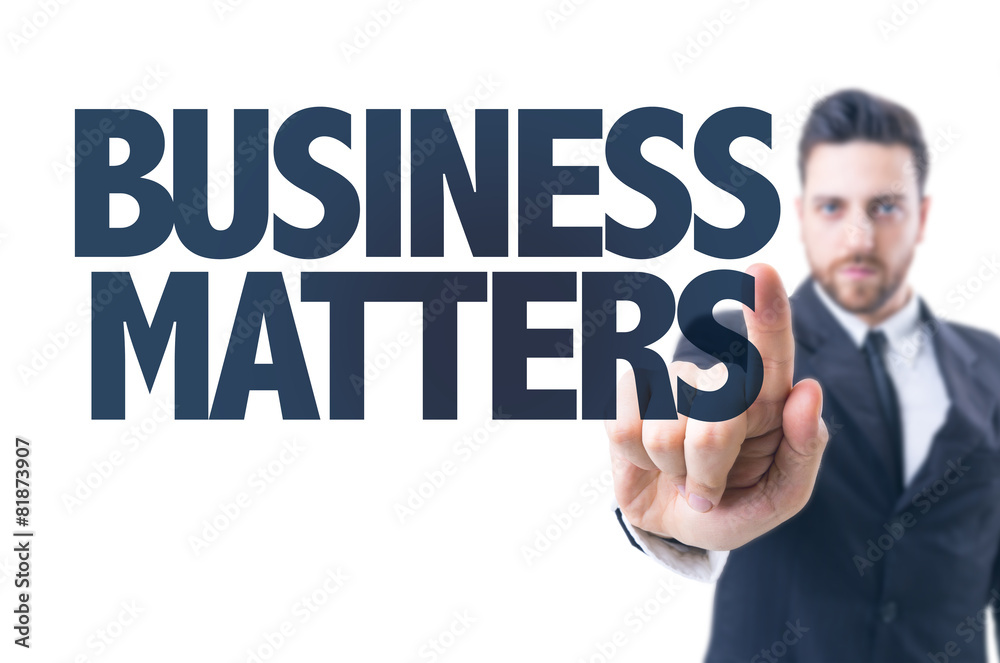 Business man pointing the text: Business Matters Business man pointing the text: Business Matters