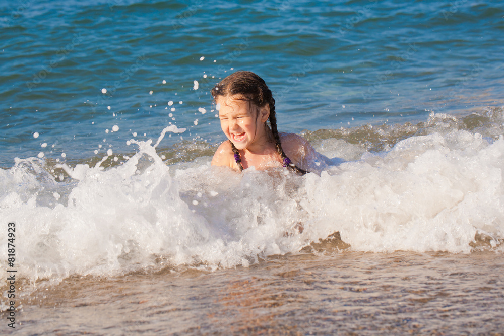 Happy kid playing playing on beach Happy kid playing playing on beach