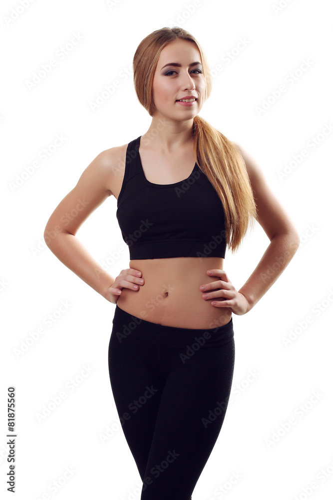 Portrait of sexy young woman looking at camera. Fitness female w Portrait of sexy young woman looking at camera. Fitness female w