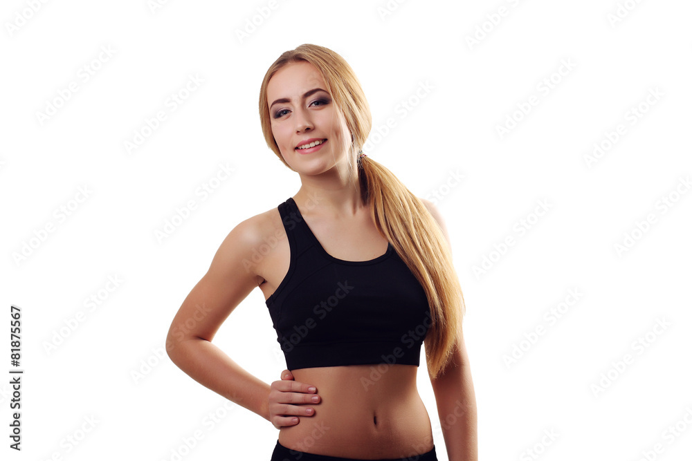 Portrait of sexy young woman looking at camera. Fitness female w