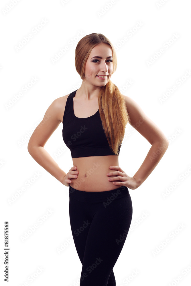 Portrait of sexy young woman looking at camera. Fitness female w Portrait of sexy young woman looking at camera. Fitness female w