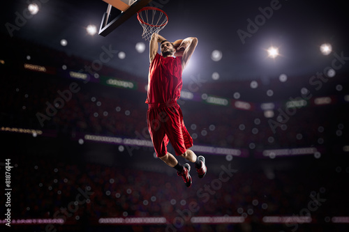 red Basketball player in action