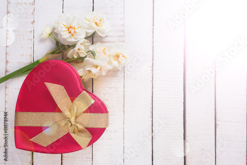 Festive gift box and flowers