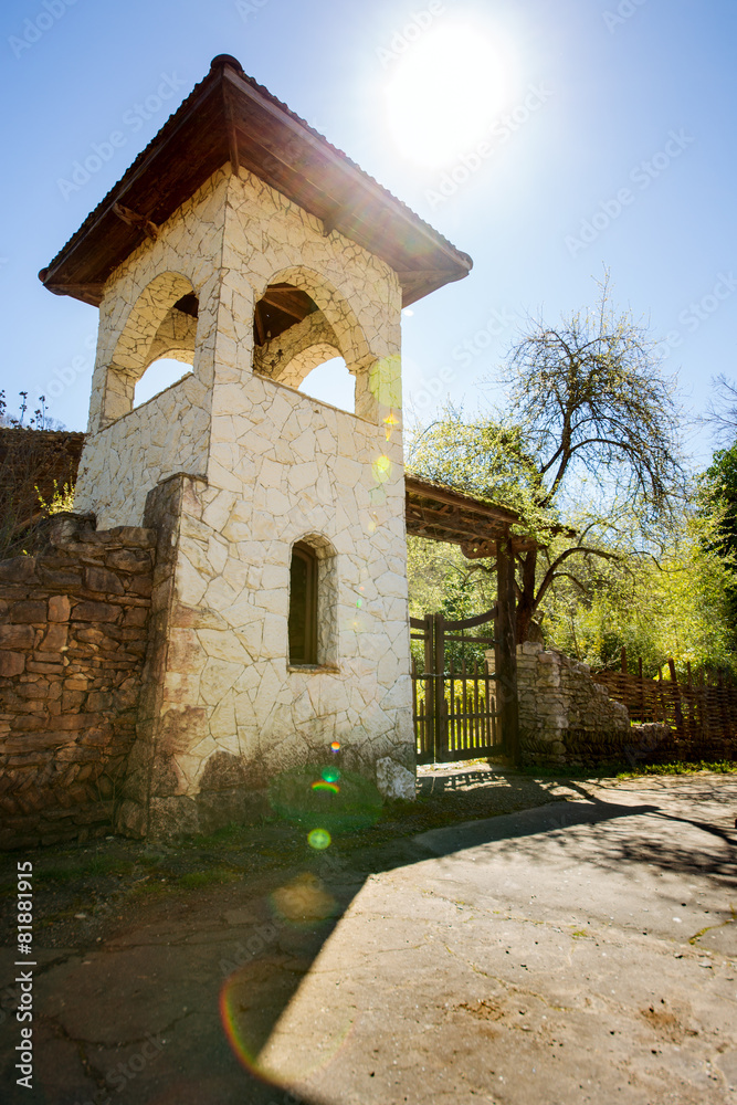 Fototapeta premium Stone tower with a fence