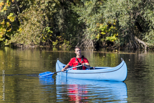 Young man in canoe