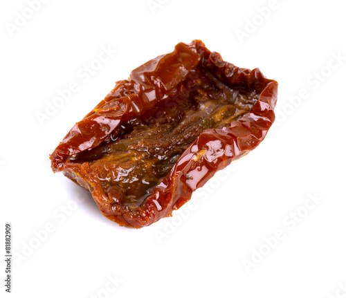 sun dried tomatoes with olive oil isolated on white