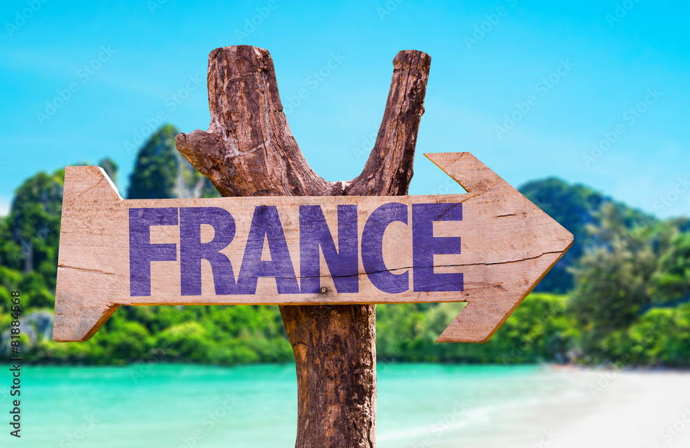 France wooden sign with beach background