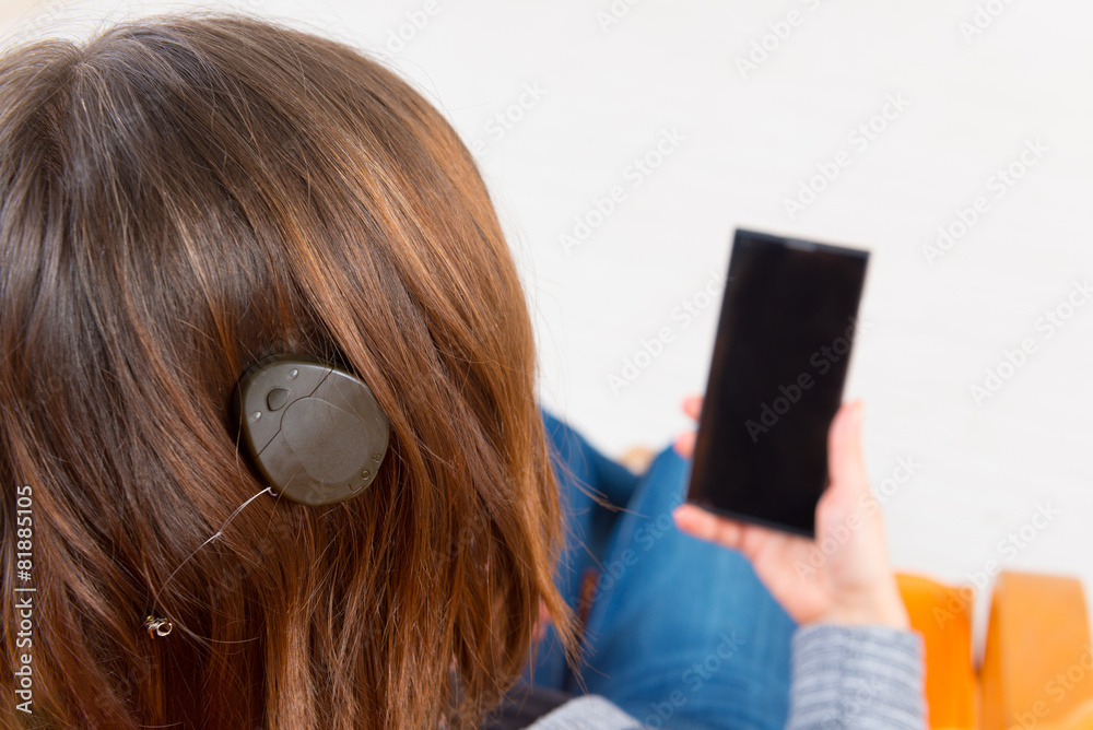 Fototapeta premium Deaf woman using smartphone