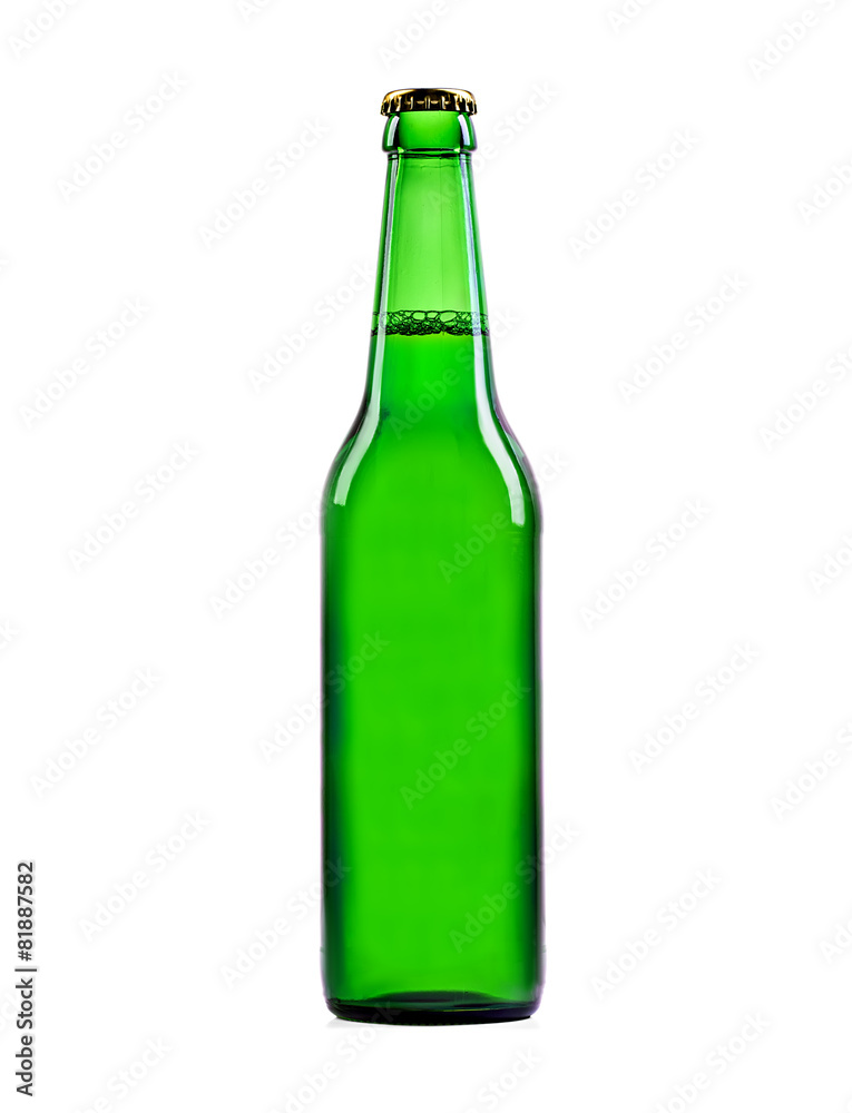 Beer in a green bottle isolated on a white background Beer in a green bottle isolated on a white background