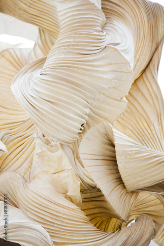 Abstract shapes of a paper ornamental object, like a sculpture