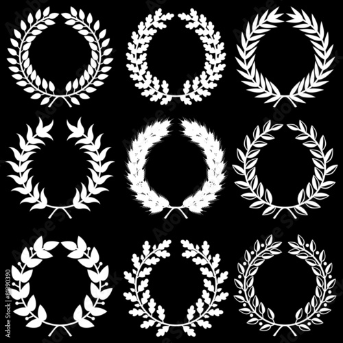 White laurel wreaths on black background set