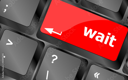 wait word button on a computer keyboard