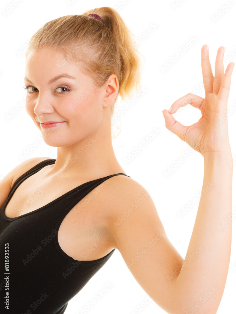 Fitness sporty girl showing ok okay hand sign gesture Fitness sporty girl showing ok okay hand sign gesture