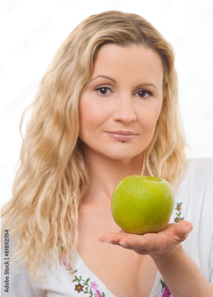 Young housewife with green apple