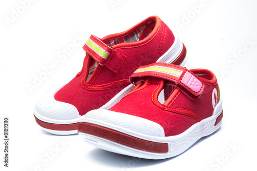 pair of red child sneakers